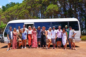 Group of people having a wine tour