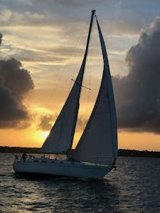 sail boat in the sunset