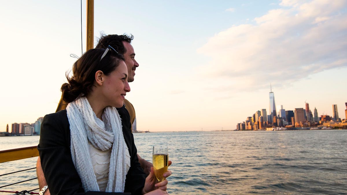 Couple drinking wine and enjoying view of NYC