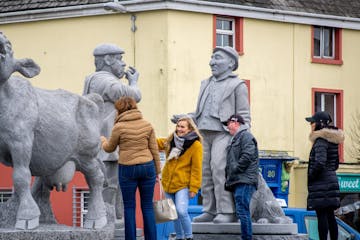 A group of people doing a walking tour of Ennis