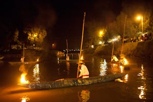 a boat docked at night