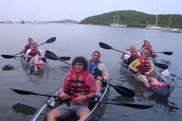 Group picture of kayakers in water