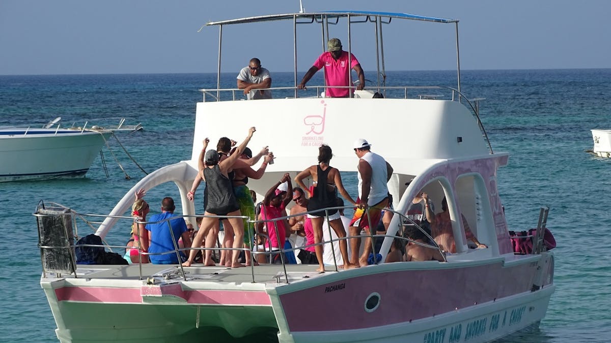 people dancing on boat