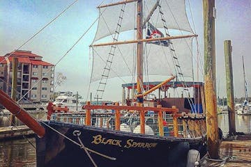 Pirate ship docked at harbor