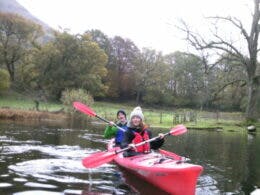Couple kayaking in The Lake District in Winter