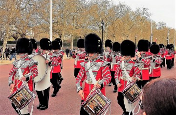 a group of people standing in front of a crowd