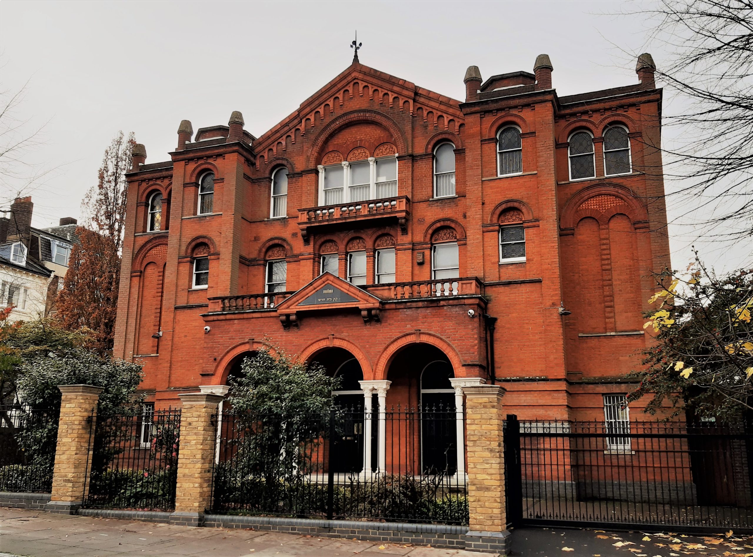 a large brick building with Brooklyn Historical Society Building in the background