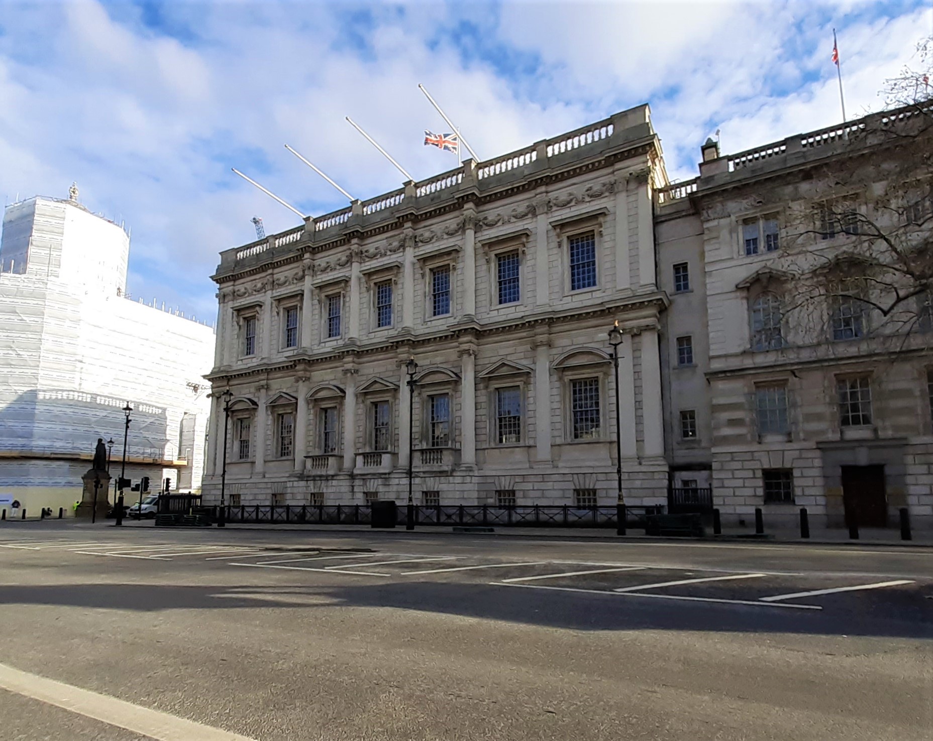 a large building by a road