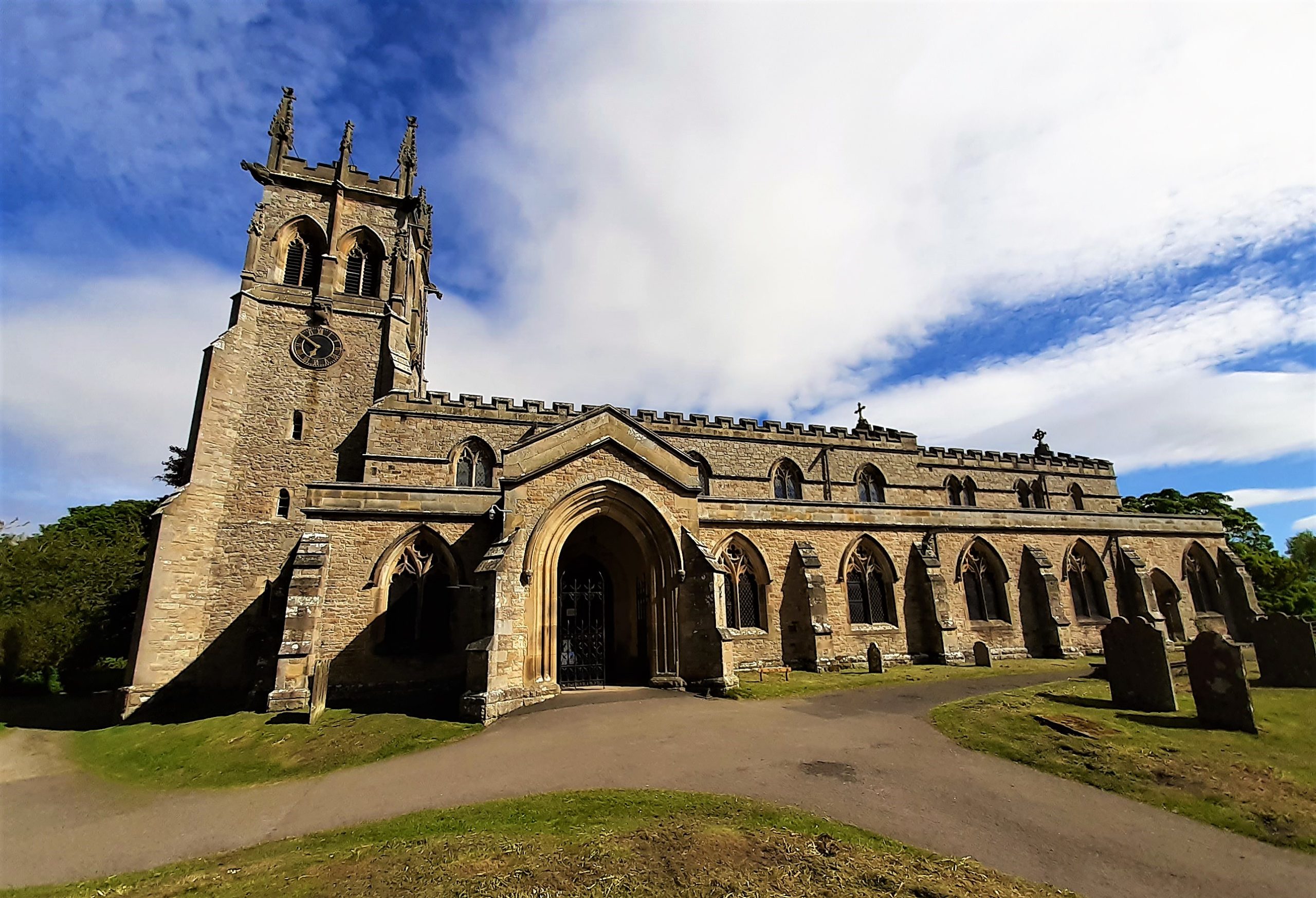 a large stone building with a clock tower