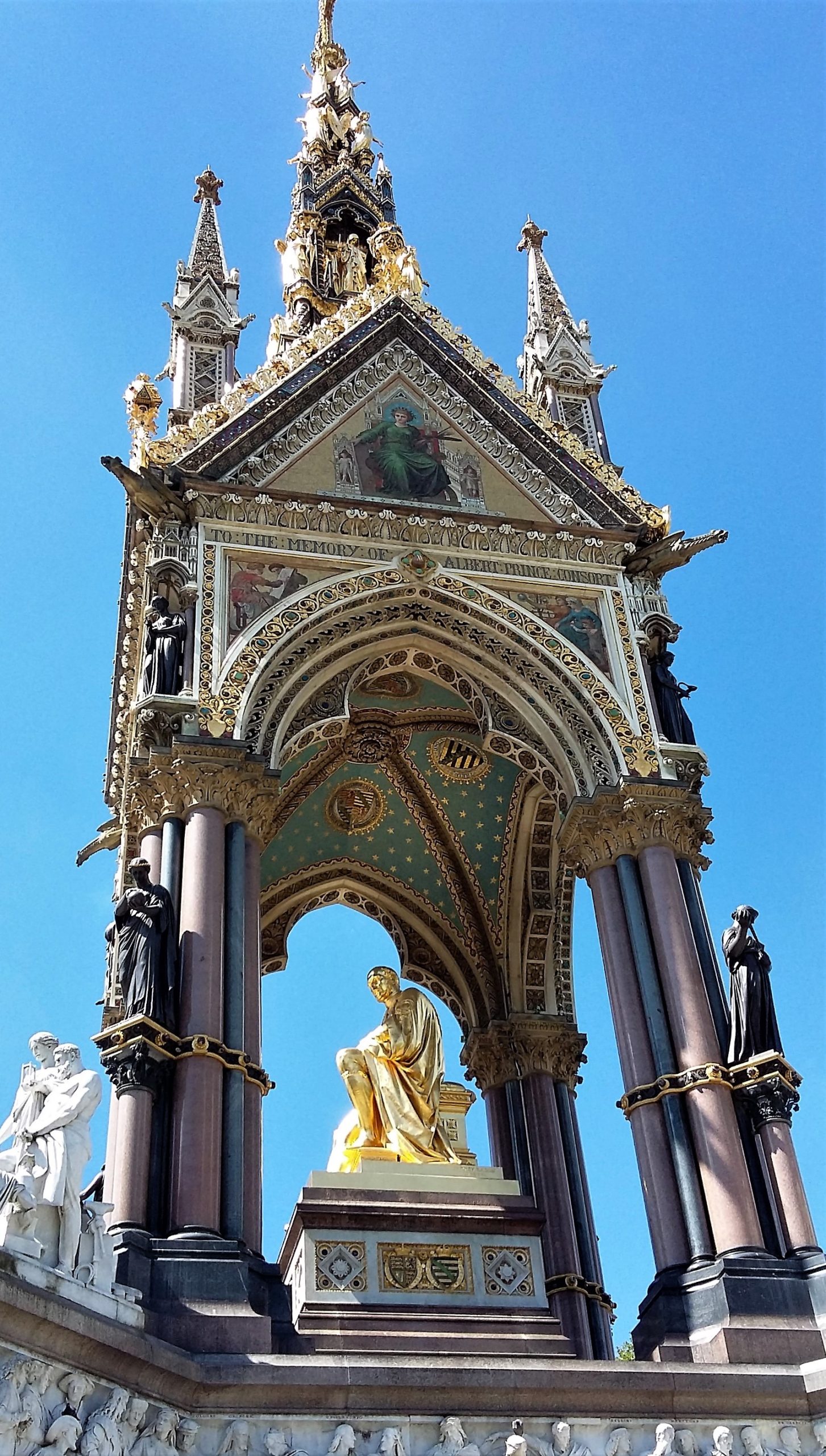 a clock tower in front of a building