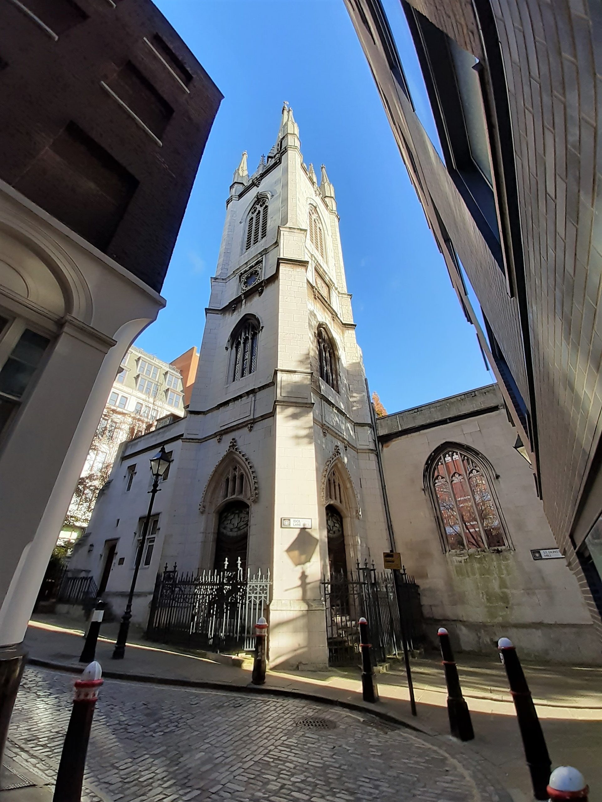 a church with a clock on the side of a building