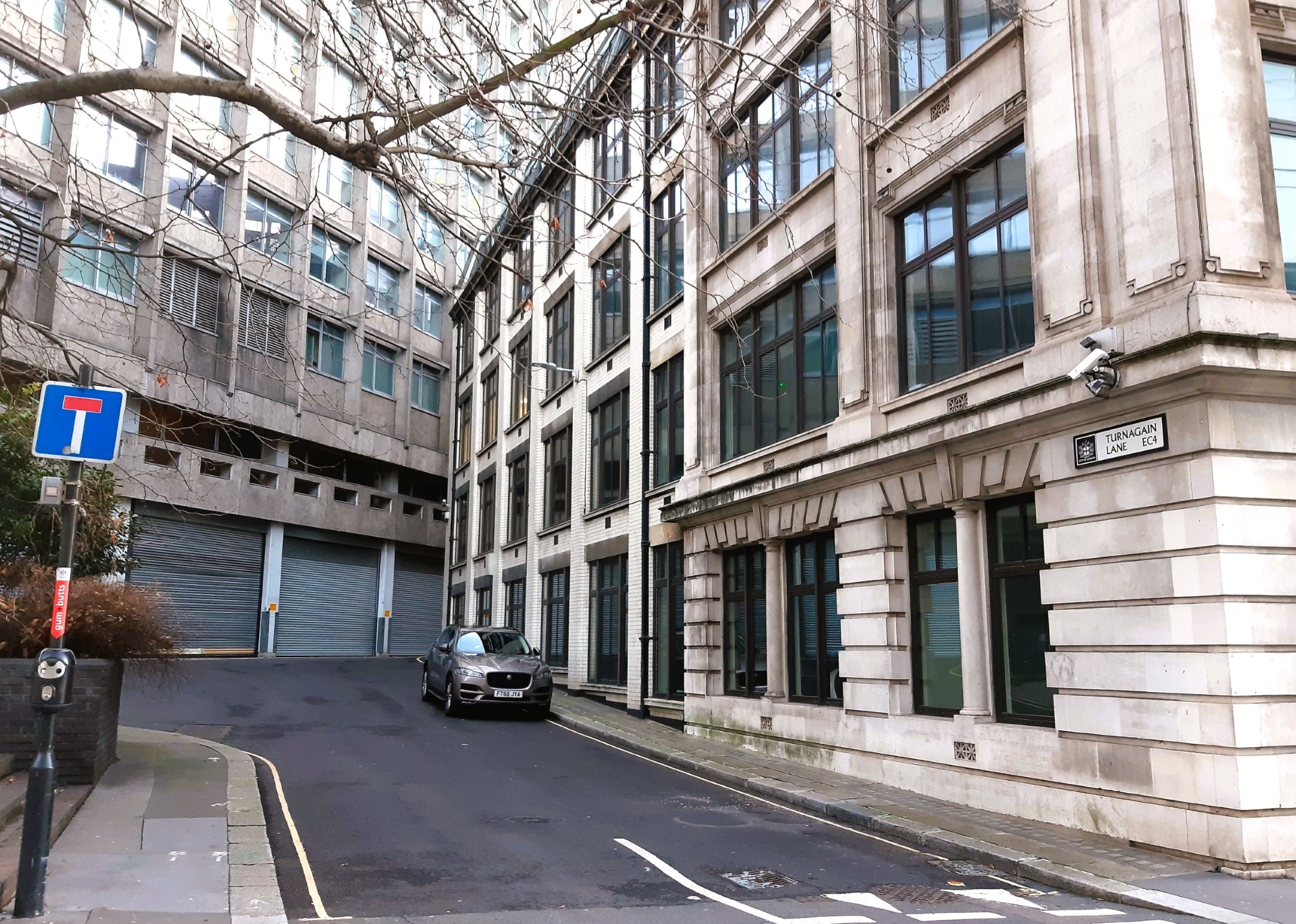 a close up of a street in front of a building