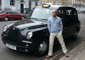 Graham and his old London taxi in 2014