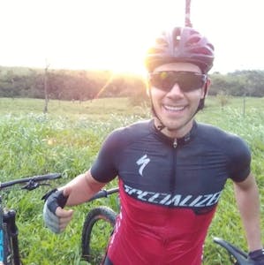 Daniel Lalinde holding a mountain bike