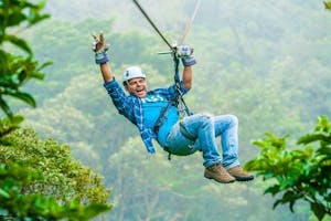 A man doing ziplines in Monteverde Costa Rica