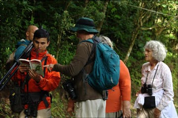 A group with a tour guide on a Monteverde Bird Watching Tour.