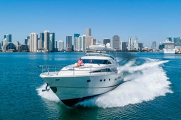 Miami Beach yacht rental cruising along the Port of Miami.