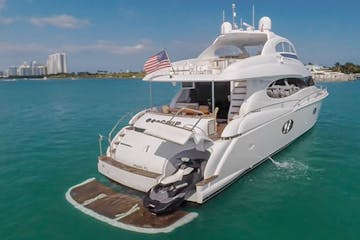 Jetski and hydraulic swim platform on this Aventura yacht rental.