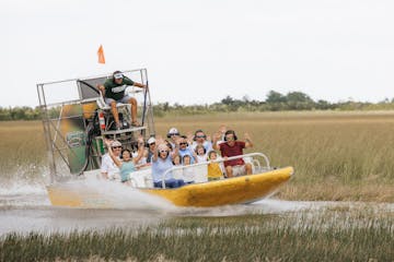a group of people riding on a boat