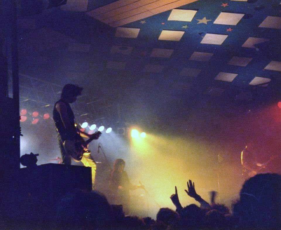 a group of people in a dark room