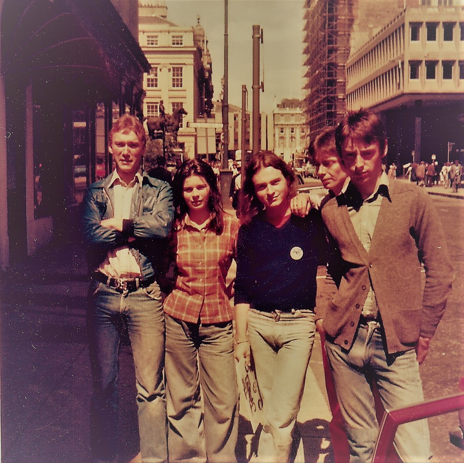 a group of people posing for a photo