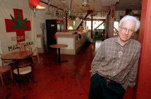 Dennis Peron standing in his Cannabis Buyers Club, the first SF dispensary.