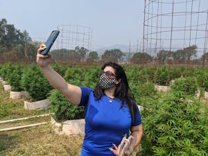 A cannasseur takes a selfie on one of the pot farms in California's Emerald Triangle