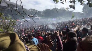 a group of people smoking weed on Hippie Hill in San Francisco