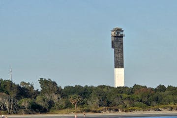 small tower near a body of water