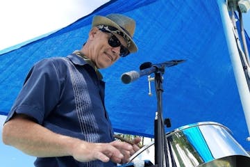 a man wearing a blue hat