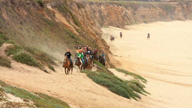 Group riding on the Half Moon Bay bluffs