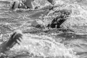 Women swimming in triathalon