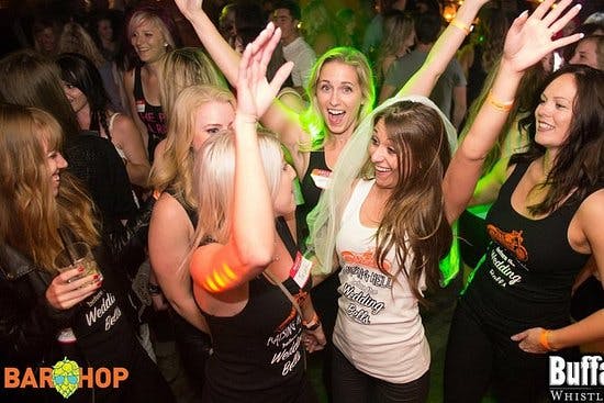 women dancing at a club in Whistler.