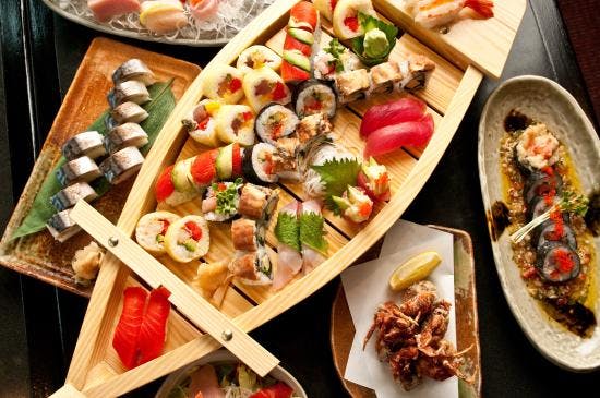 a box filled with different types of food on a plate