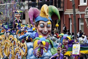 Mardi Gras float rolling down city street in New Orleans