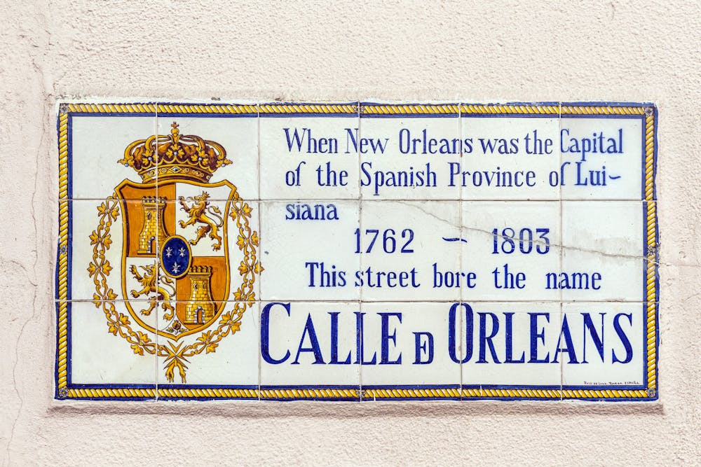 old street name Calle de Orleans painted on tiles in the French quarter in New Orleans