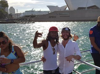 two guys in front of opera house in Sydney