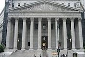 a large building with Federal Hall in the background