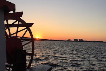Paddle wheel and sunset