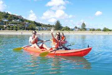 Hire a double kayak from Paddle Nelson for one or two hours to explore the sea in Nelson