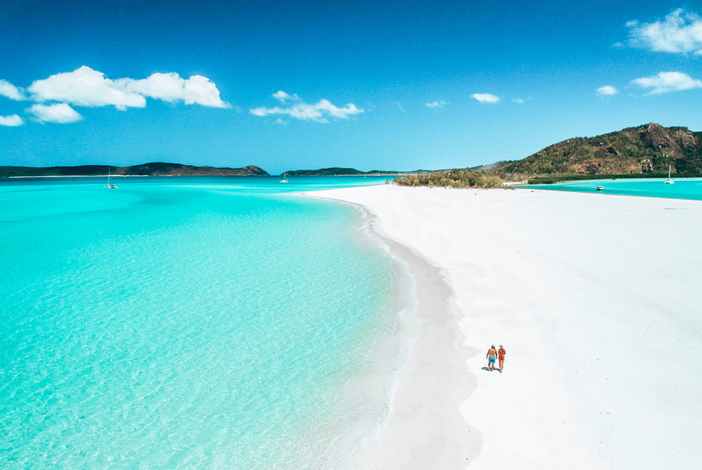 a body of water with Whitehaven Beach in the background