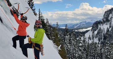 views of the snow-covered Cascades while on an intermediate ice climbing course