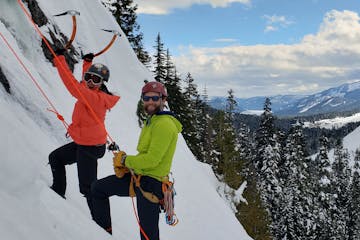views of the snow-covered Cascades while on an intermediate ice climbing course