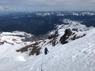 a climber on a guided mountaineering trip ascends the North Ridge of Mount Baker