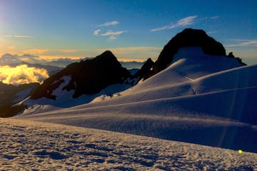 a dramatic sunset on Mount Olympus during a Kaf Adventures mountaineering course