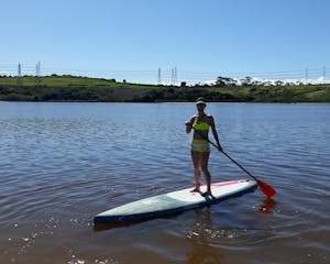 oona tibbetts stand up paddle boarding in Carlsbad lagoon