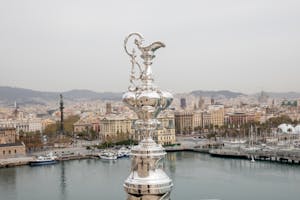 Americas Cup with Barcelona city in the background