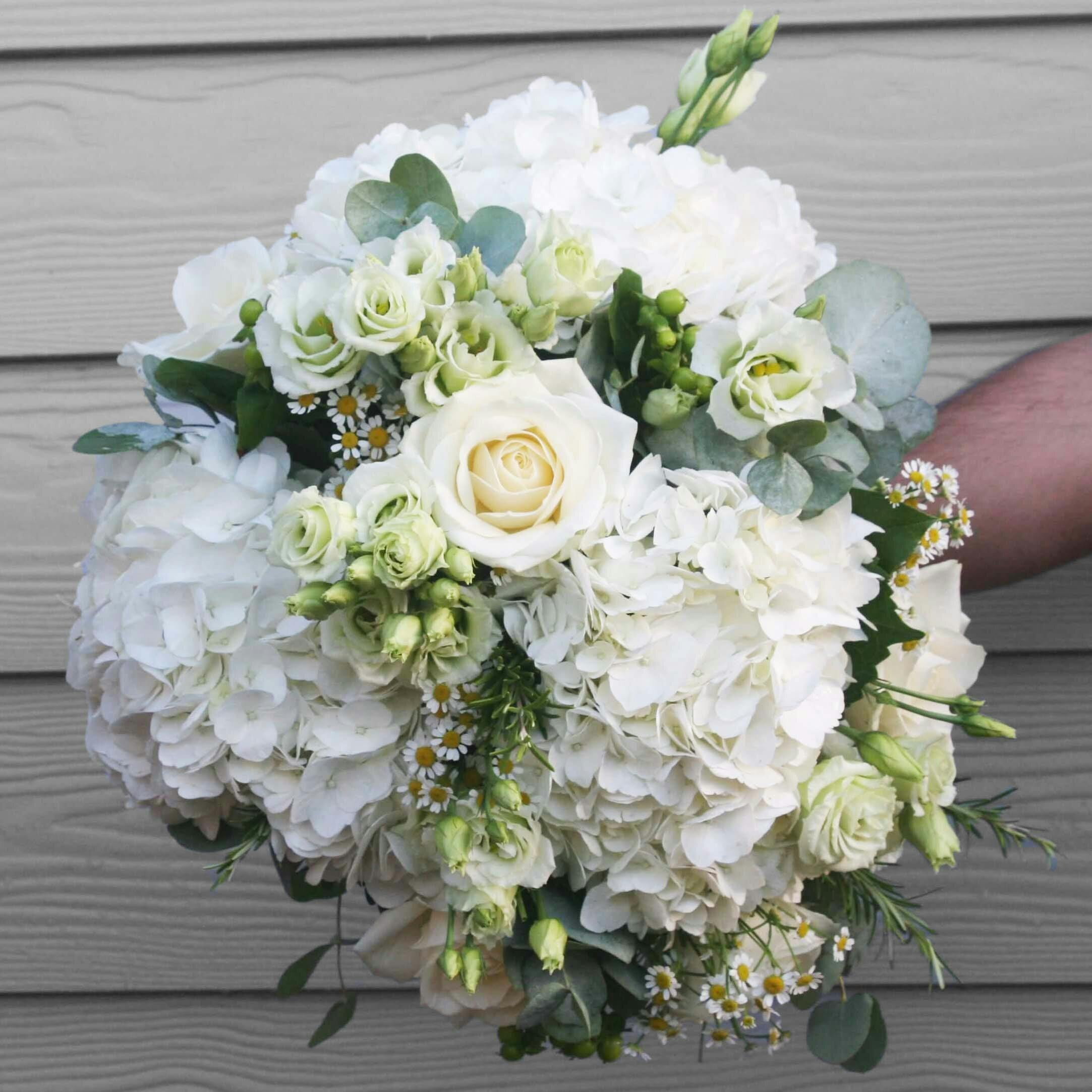 a bouquet of flowers on a table