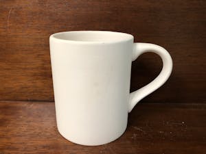 a close up of a coffee mug