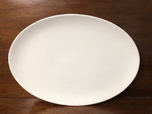 a white plate on a table